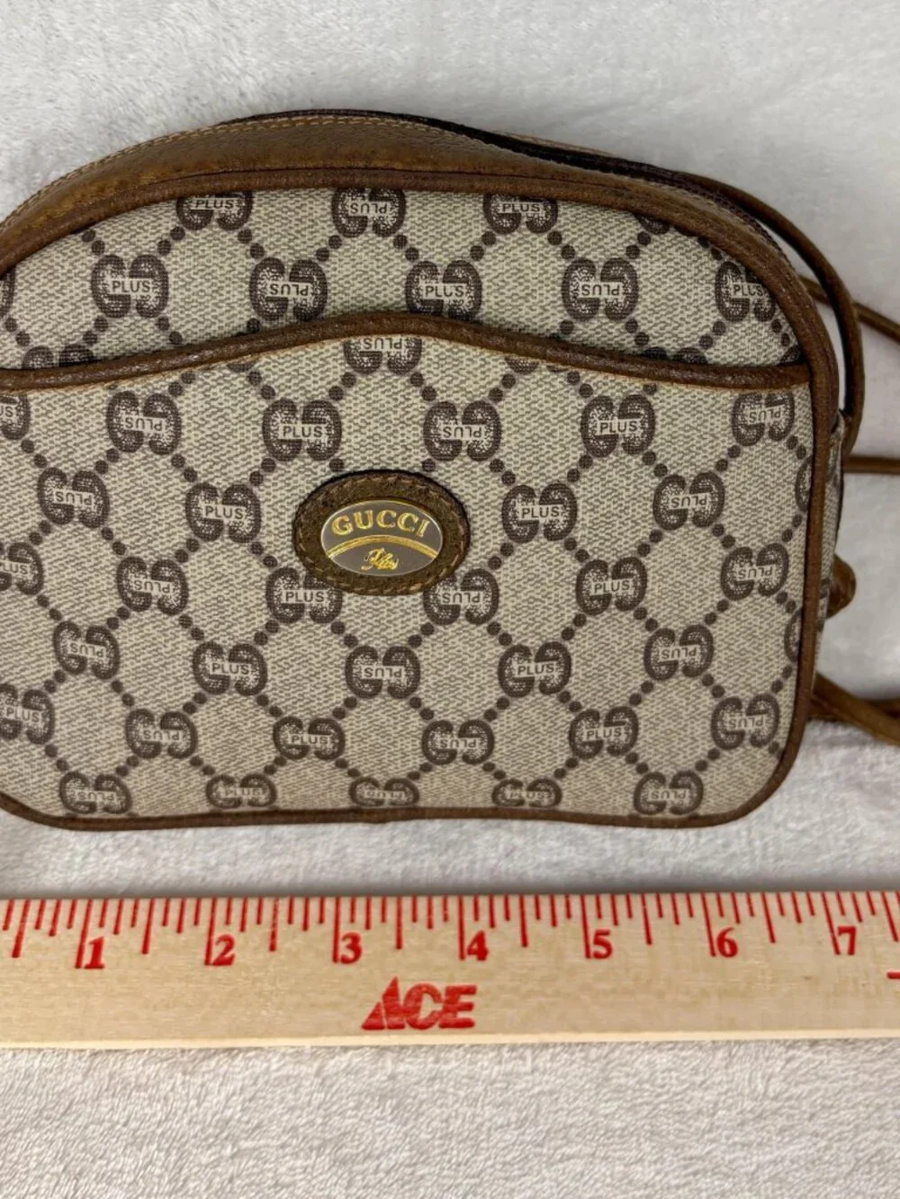 Gucci Plus GG Supreme Mini Crossbody in Monogram Coated Canvas and Leather Trim